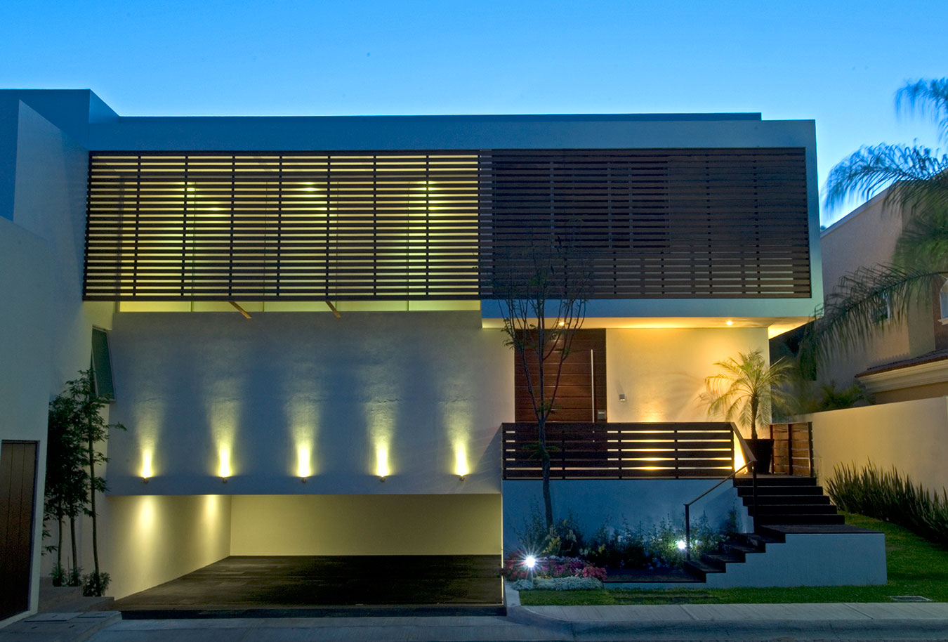 House with highlighted lighting on the facade