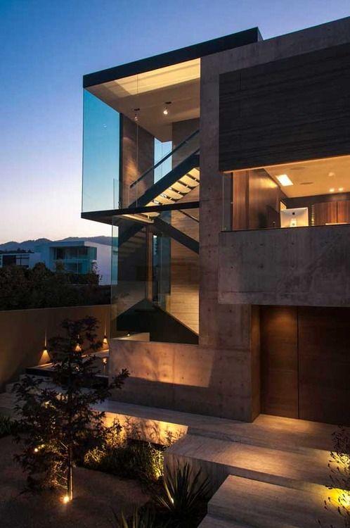 Concrete facade and glass plane create a contemporary look