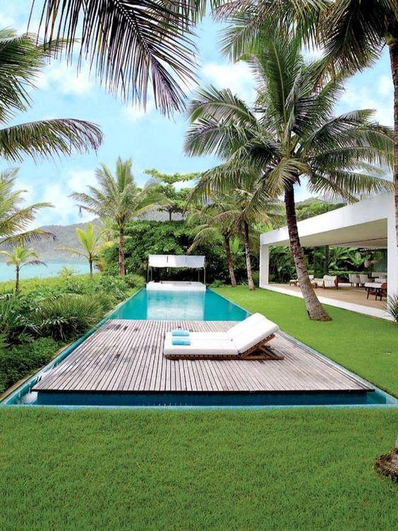 Pool with wooden floating deck