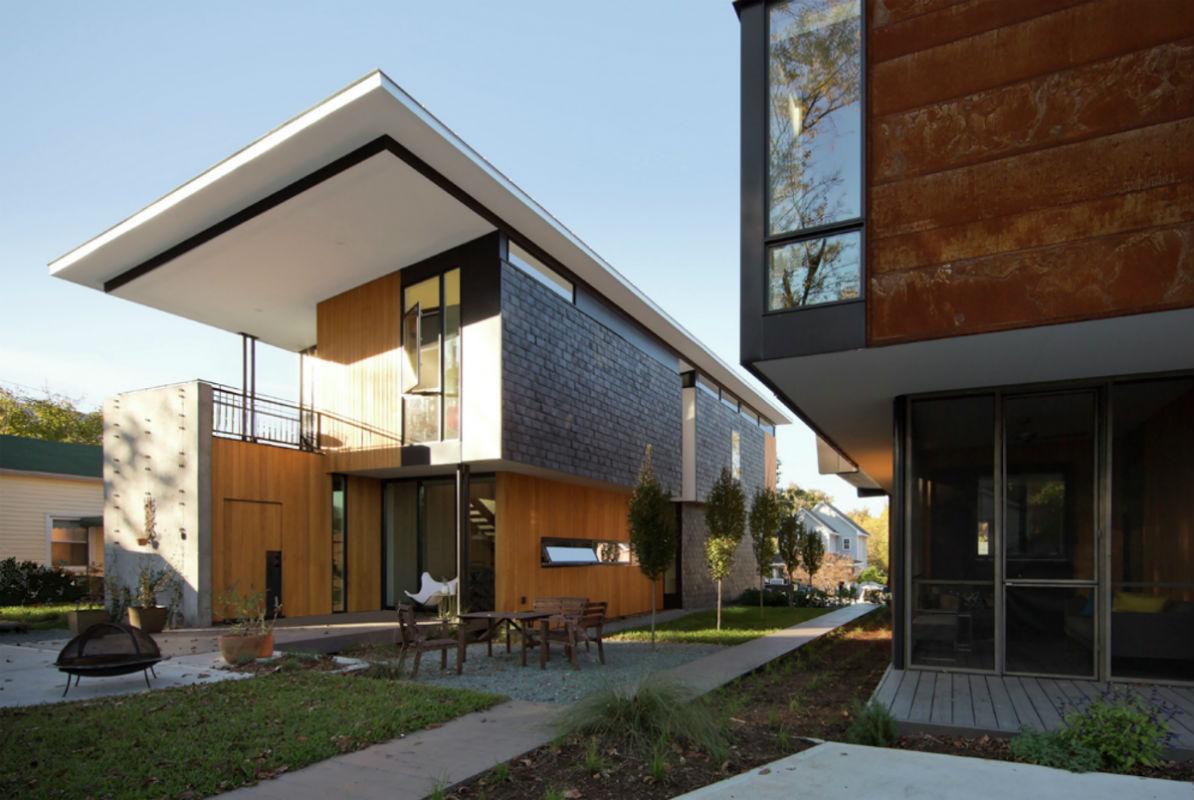 House with wood facade and brick view