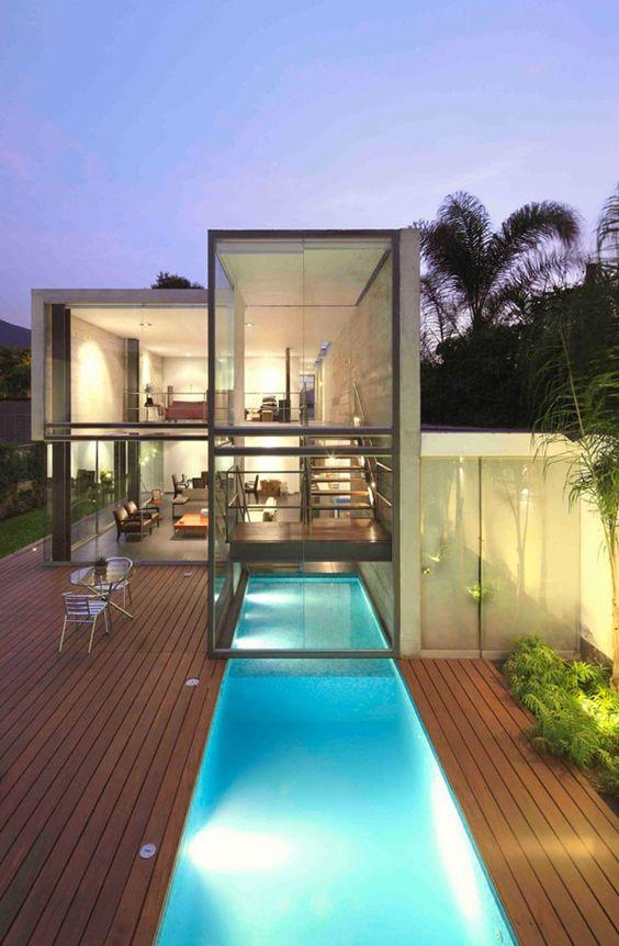 Swimming pool entering the interior of the residence