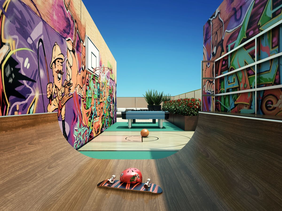 Playground pequeno com pista de skate, quadra e mesa de jogos.