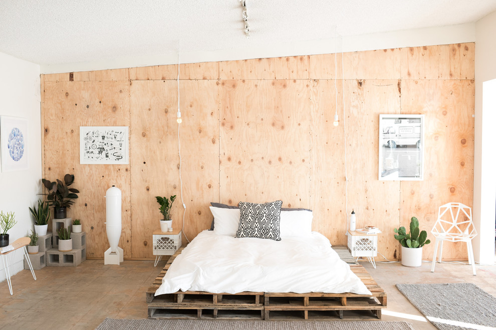 Quarto minimalista com cama de pallet