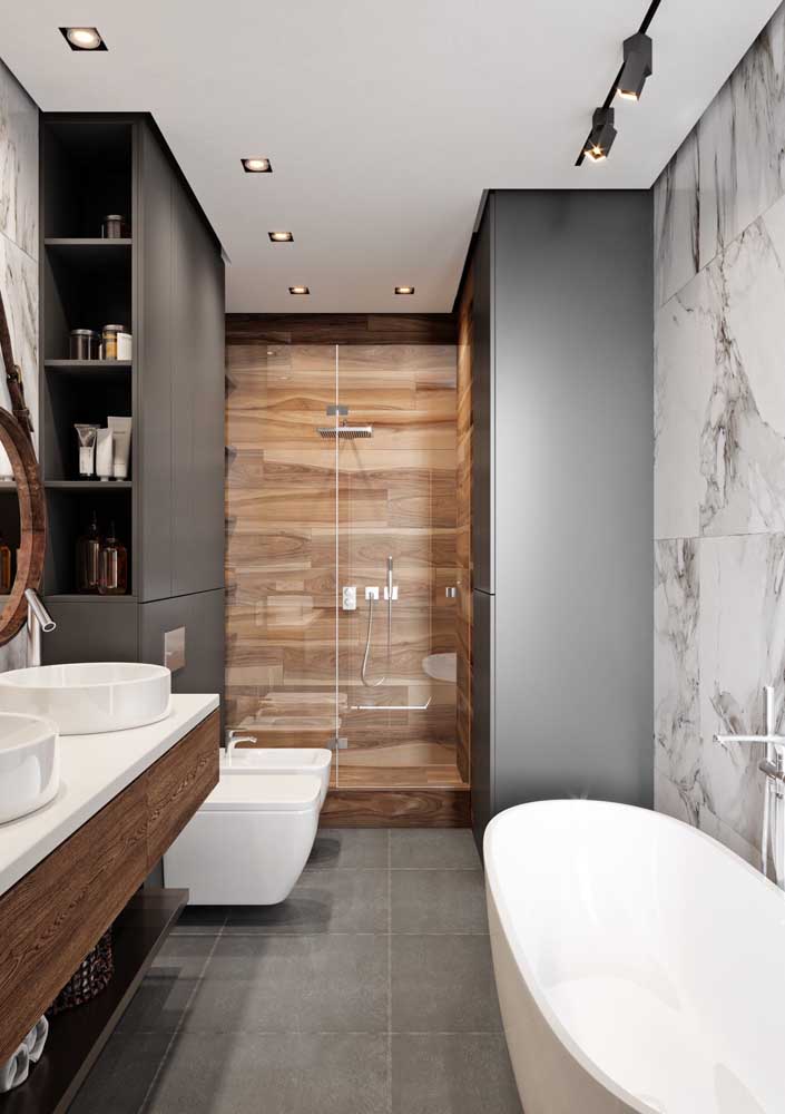 Modern luxury bathroom in white, black and brown tones.  Highlight for the flooring imitating marble and wood