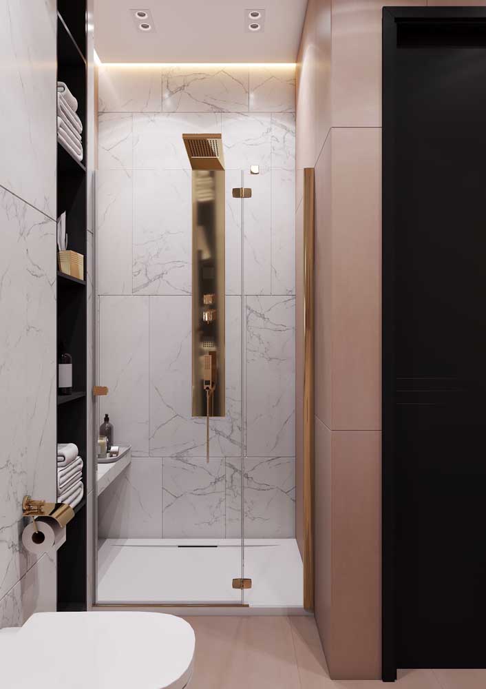 Luxury pink bathroom with gold accents and marble cladding