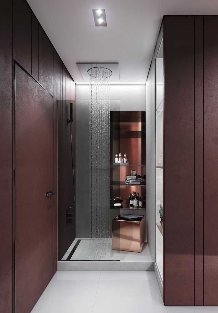 This other luxury bathroom has earthy walls and a shower installed directly on the ceiling