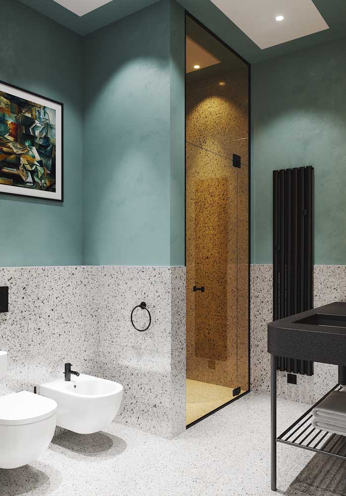 Granilite for a modern and luxurious bathroom.  Another highlight is the colored glass door that gives access to the box