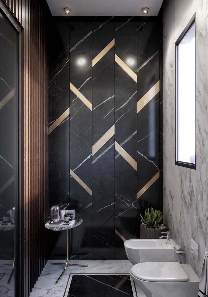 The golden details reaffirm the sophisticated and glamorous proposal of the bathroom