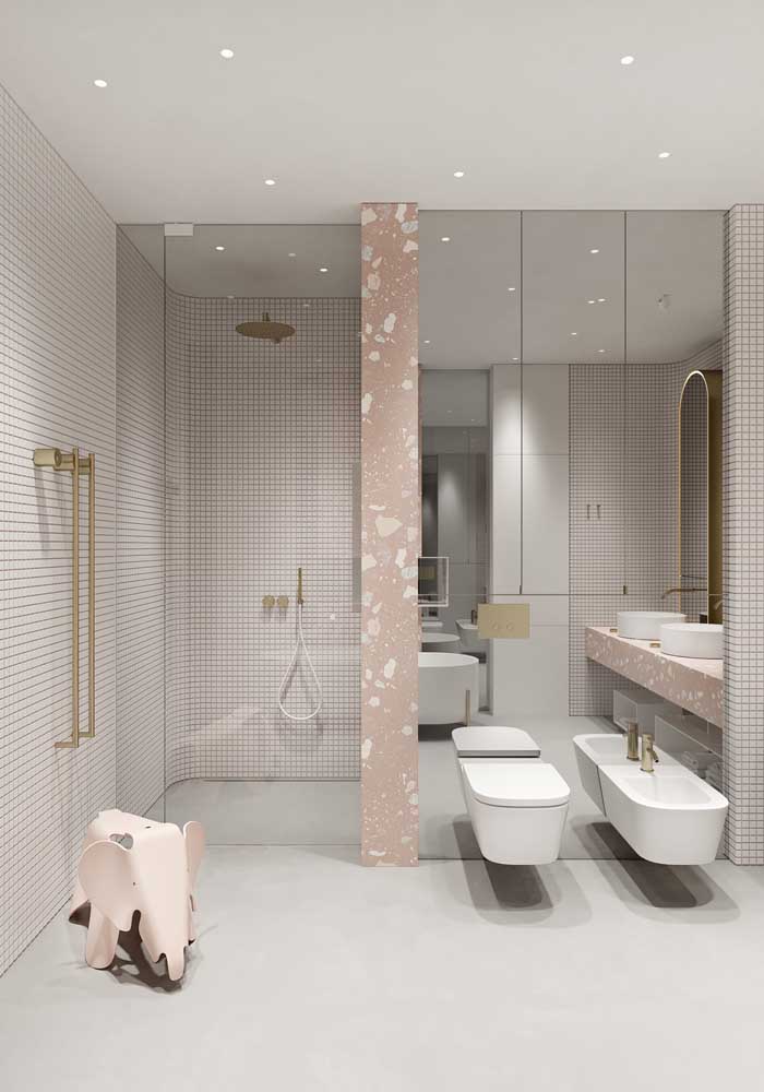 Relaxing touch for this luxury bathroom with pink walls and elephant shaped bench