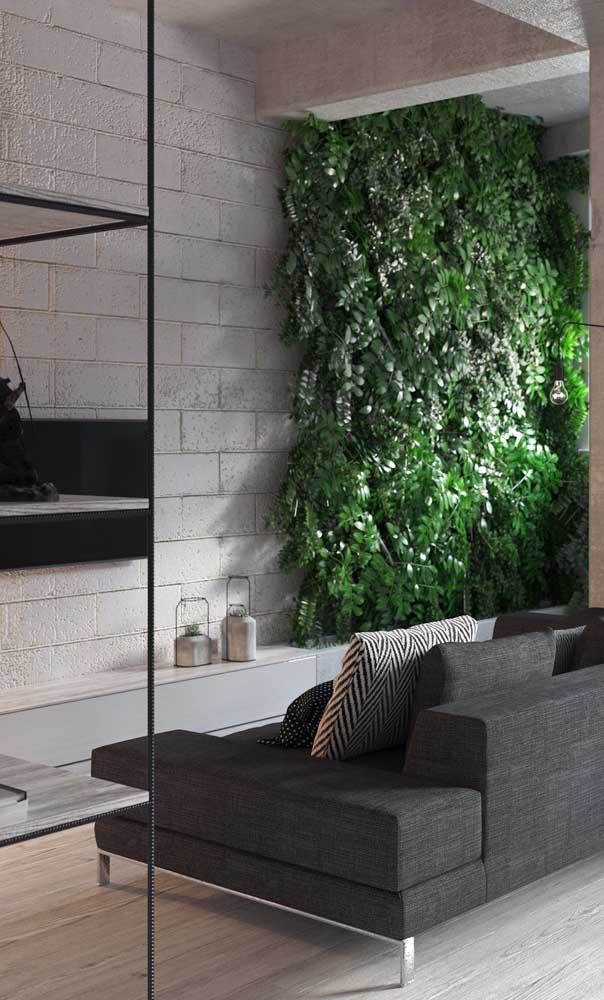 Small industrial style living room decorated with green panel on the wall