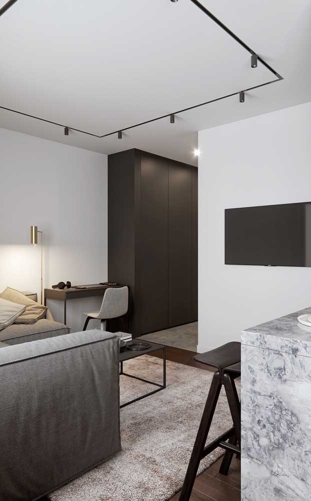 Super stylish and modern this living room in shades of white and black