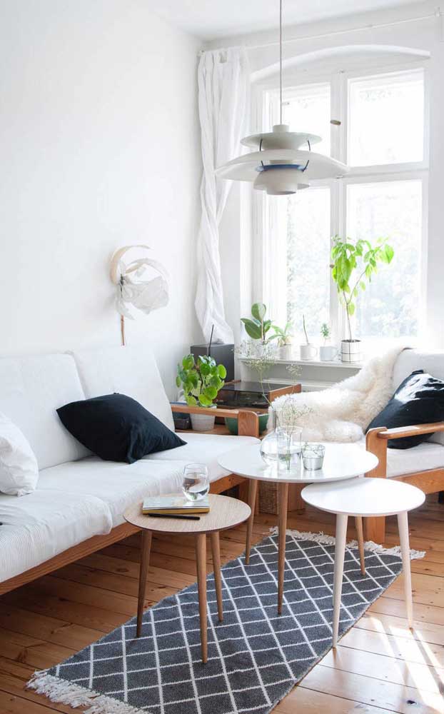 Beautiful combination of white and wood in this small living room