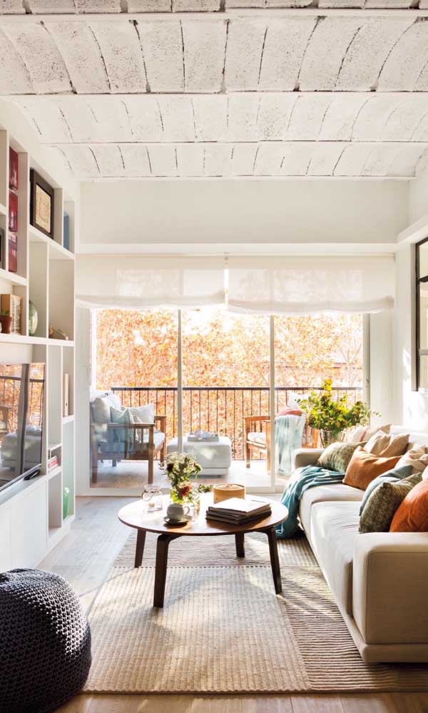 What doesn't a high ceiling do for a small living room?