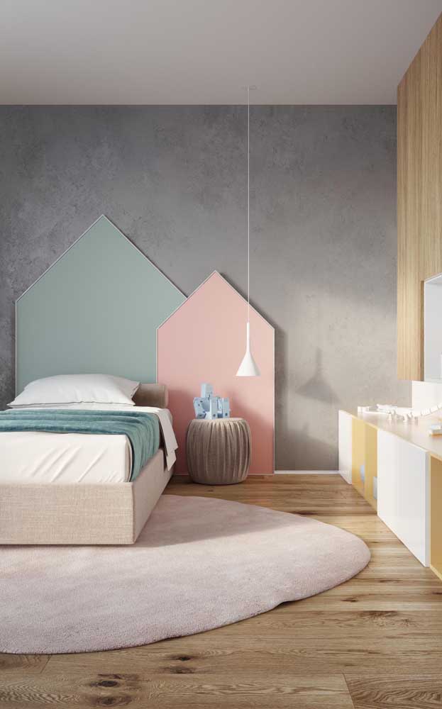 Soft-colored kids' single room with modern details, like the burnt-out cement wall in the back