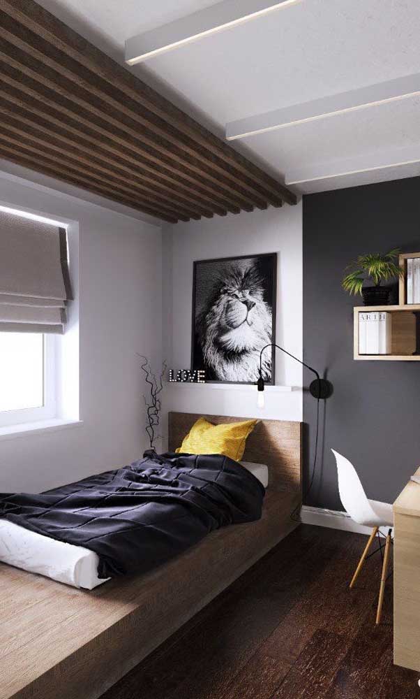 Wood is the highlight of this other single room.  Note that the material is on the ceiling, the bed and the floor.