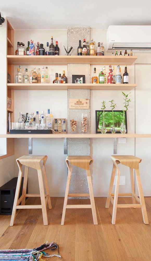 A very simple and easy to make home bar.  Note that only wooden shelves and some stools were used here.