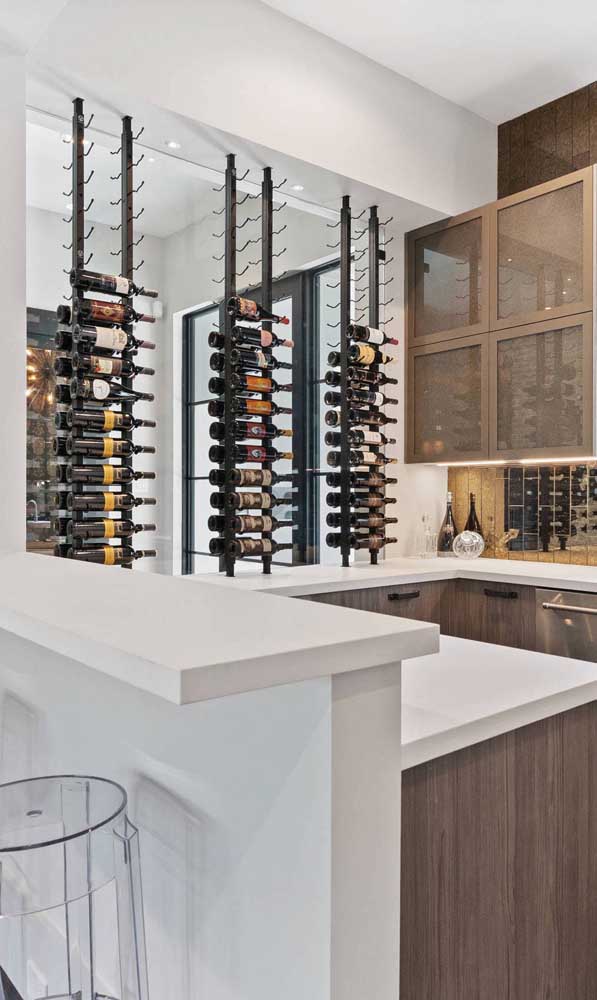 Wines stand out in this home bar set up together with the kitchen