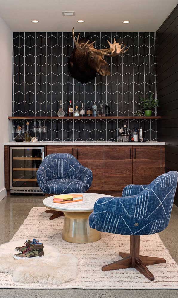 The geometric wall has created the ideal backdrop for this modern home bar