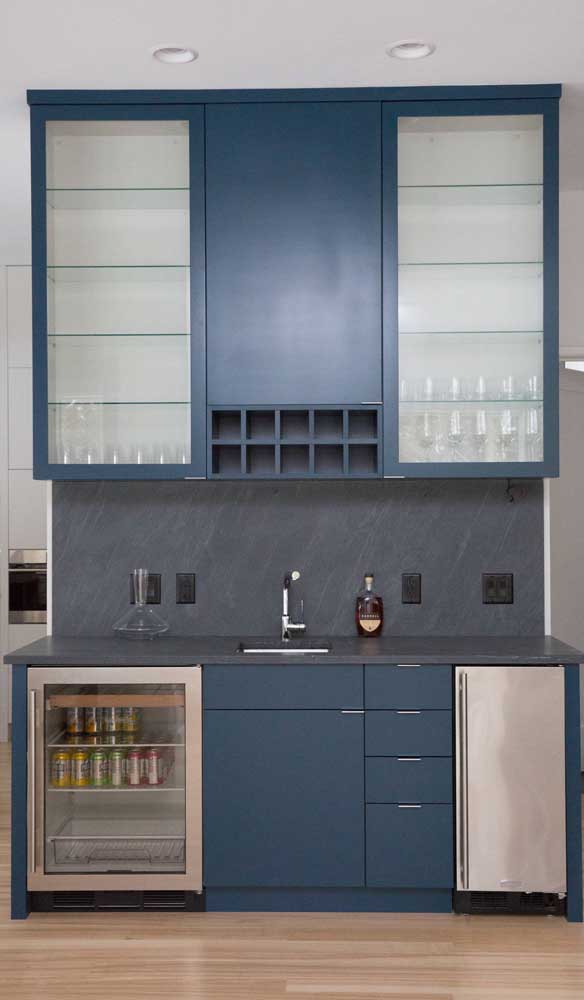 Closed cabinets keep bottles, cups and other accessories better protected