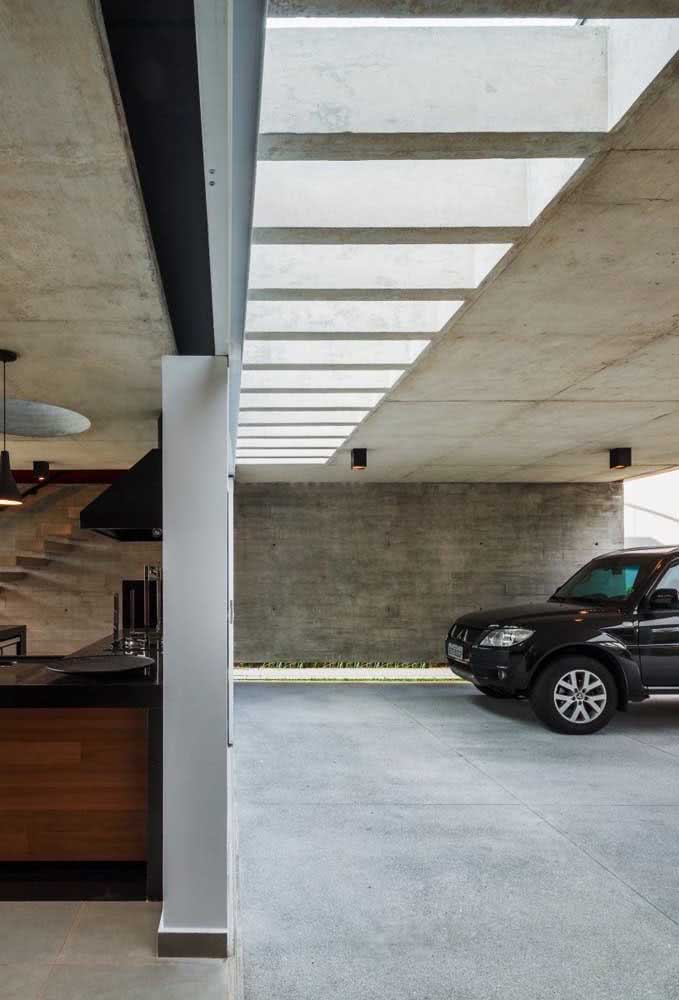 Pergolado de concreto para garagem. Uma boa opção para iluminar essa área da casa