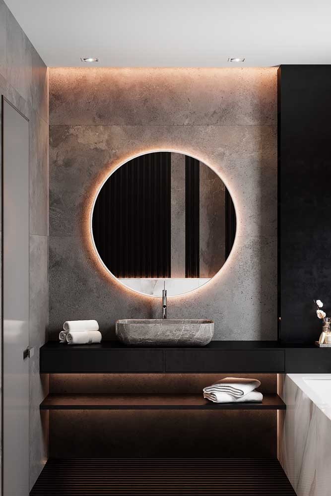 Espelho redondo com led para o banheiro em um projeto elegante e moderno