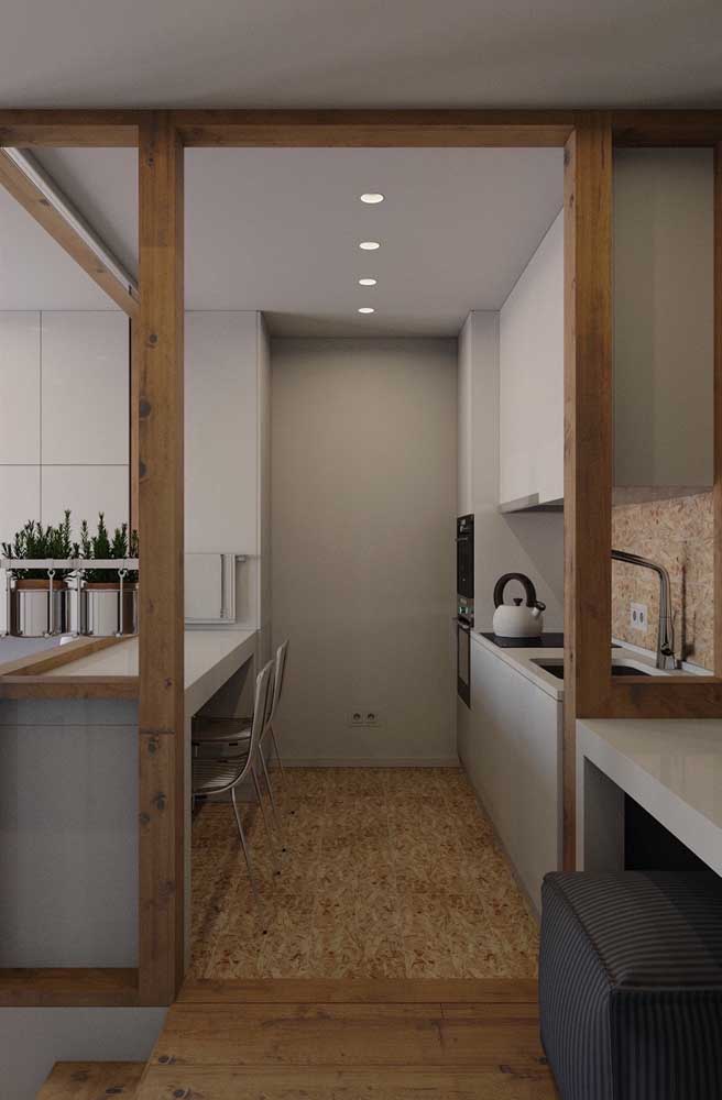 Cozinha planejada pequena e moderna em formato corredor
