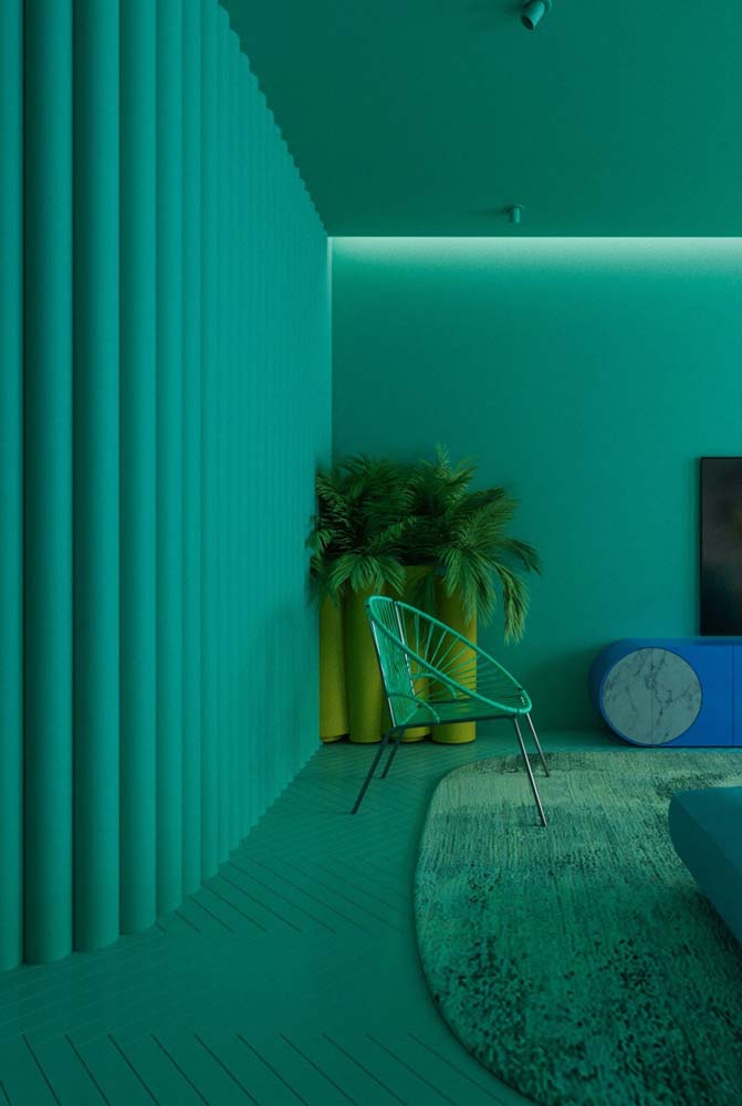 Uma sala de estar conceitual toda com revestimento verde água