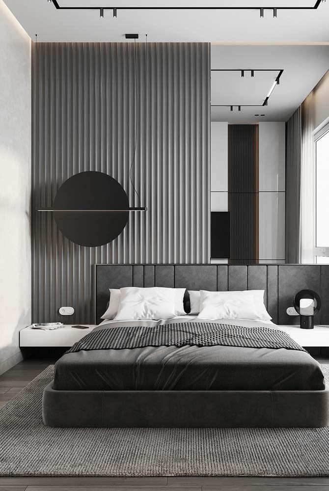 Tudo sóbrio, tudo cinza: que tal uma opção mais monocromática de quarto moderno de casal?