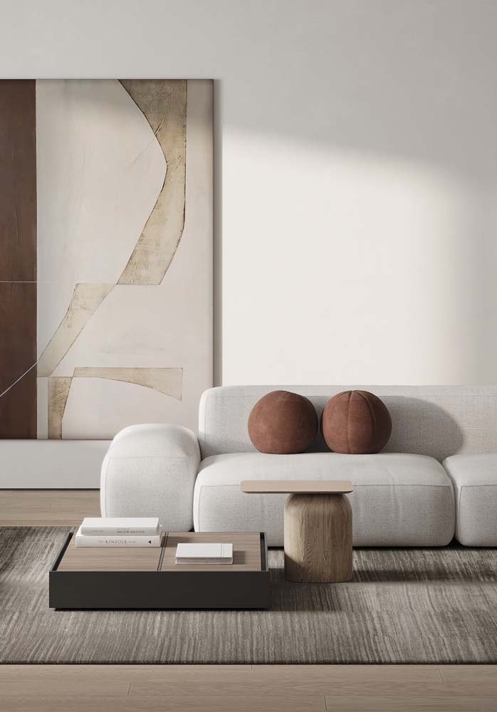 Acerte na escolha do quadro combinando com os móveis e o estilo de decoração da sala de estar.