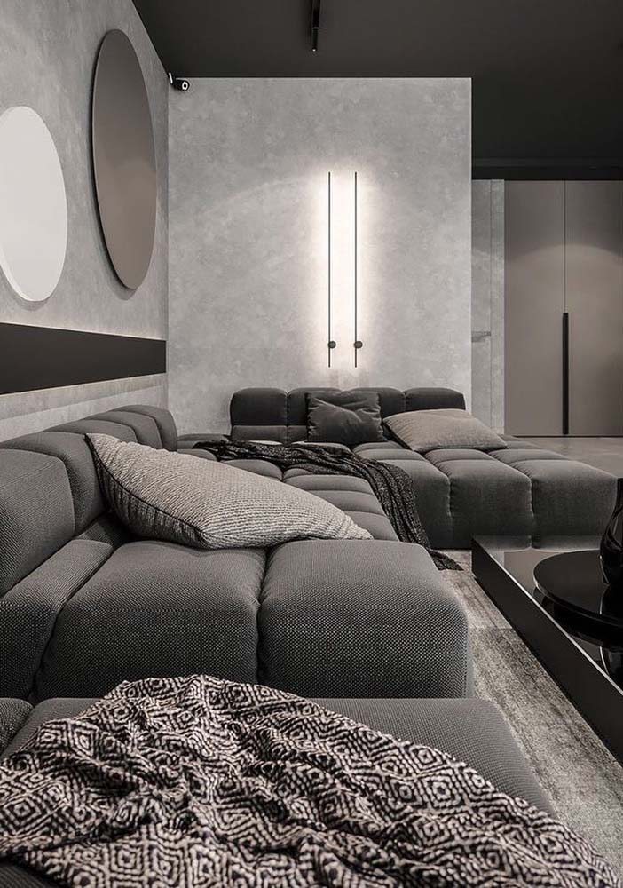 Na hora de assistir um filme, o sofá ilha pode virar um sofá de canto