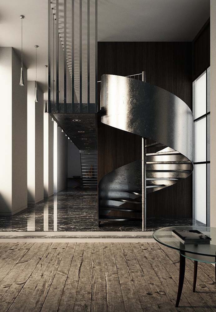 Moderna e elegante: escada caracol com revestimento cromado em ambiente moderno.